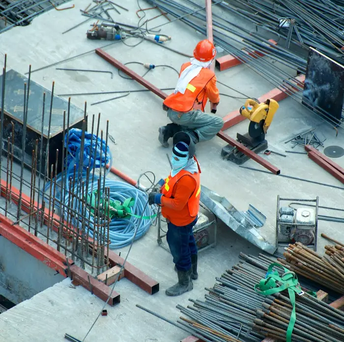 Builders working on a construction site